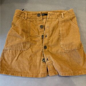 Tan corduroy mini skirt with button-up front and 2 pockets #miniskirt